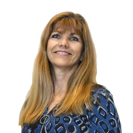 Alzina Jones, with long straight blonde hair, is wearing a blue patterned top, smiling and looking slightly to the side against a white background.