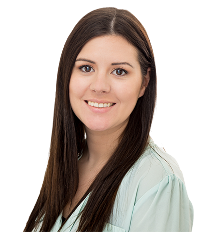 Caitlin Parlee, with long straight brown hair and a light-colored blouse, smiles at the camera against a plain background.